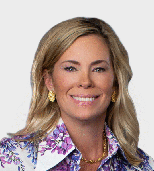 Professional headshot of a woman smiling